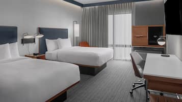 Premium bedding, down comforters, pillowtop beds, desk