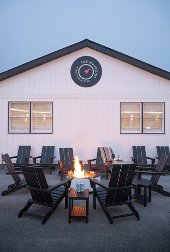 Relax in Rehoboth Beach with Outdoor Fireplace, Free Weekend Breakfast & Parking