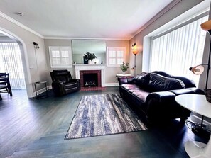 TV, fireplace - Spacious four-bedroom home (Logan)