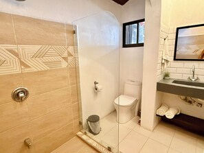 Apartment, 1 King Bed, Patio, Garden View | Bathroom | Shower, free toiletries, hair dryer, towels