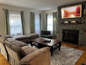 Smart TV, fireplace, books