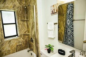 Hair dryer, towels, soap, shampoo