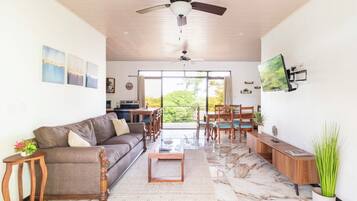 Suite, Balcony, Courtyard View | Living area | 40-inch Smart TV with digital channels, Netflix, streaming services