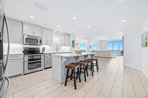 Fridge, microwave, oven, stovetop - Beachfront Spanish Key | Steps from Flora Bama | Pools, Hot Tub, Gym & More! | My Beach Getaways (Pensacola)