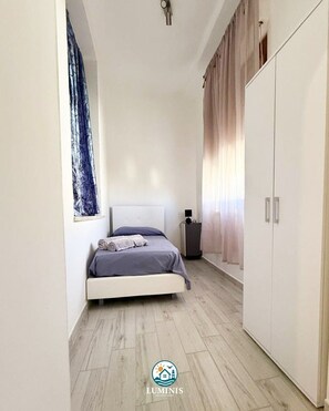2 habitaciones, tabla de planchar con plancha, wifi y ropa de cama 