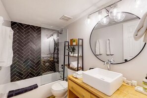 Shower, hair dryer, towels