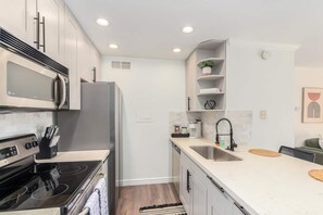 Fridge, microwave, oven, stovetop - Modern Scottsdale Condo with Community Amenities & Private Patio! (Scottsdale)