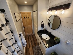 Hair dryer, towels, soap, toilet paper