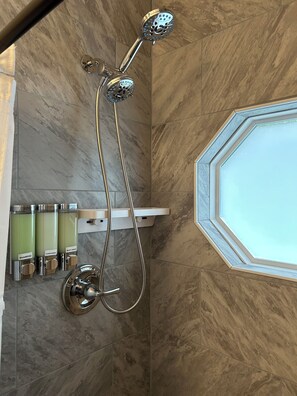 Shower, hair dryer, towels, soap