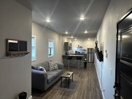 Apartamento superluxo, vista para a cidade | Área de estar
