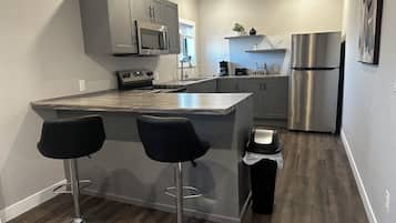 Luxury Apartment, City View | Private kitchen | Full-sized fridge, microwave, oven, stovetop