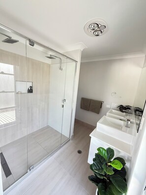 Shower, hair dryer, towels, toilet paper