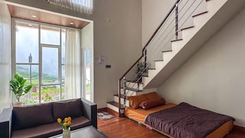 Family Villa, Balcony, Garden View | Living area
