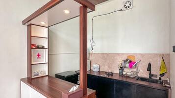 Mini-fridge, stovetop, dishwasher, cookware/dishes/utensils