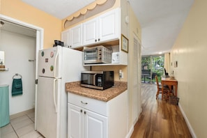 Fridge, microwave, coffee/tea maker, toaster