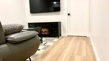 Smart TV, fireplace, books