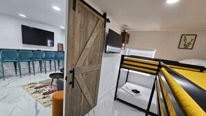 2 bedrooms, desk, iron/ironing board, travel crib