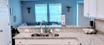 Beautiful beach themed 4-bdrm home in Sunset Beach. Newly added private fencing!