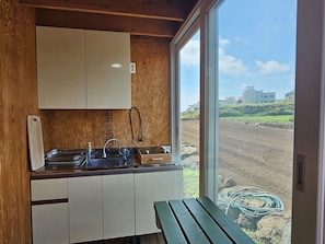 17 ping Sea View Detached House | Private kitchen | Fridge, microwave, cookware/dishes/utensils