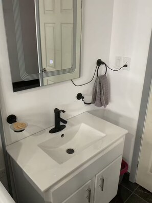 Hair dryer, towels, soap, toilet paper