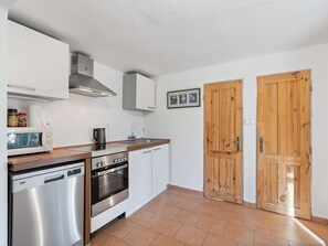 Fridge, microwave, oven, cookware/dishes/utensils