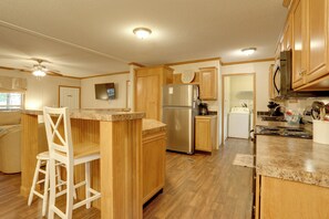 Fridge, microwave, stovetop, coffee/tea maker