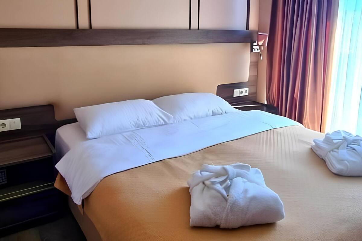 In-room safe, desk, iron/ironing board, WiFi (free)