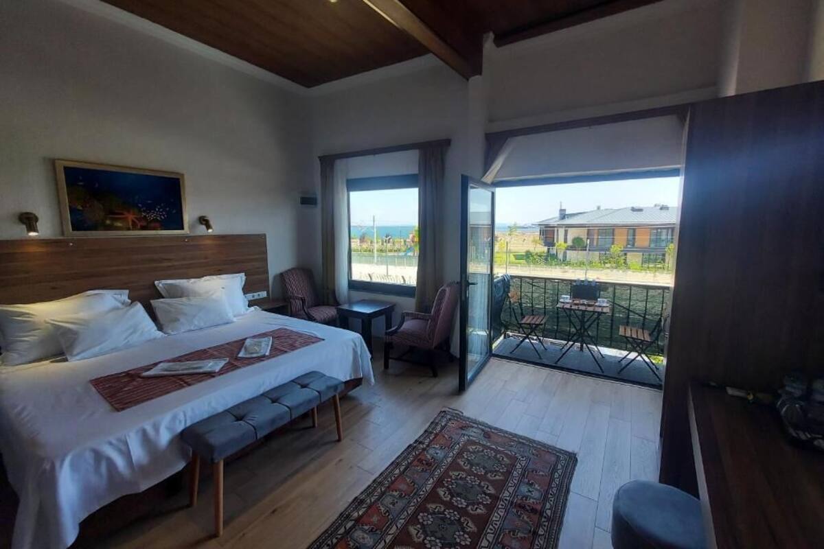 Superior Quadruple Room, Balcony, Sea View | Minibar (free items), in-room safe, blackout drapes, soundproofing