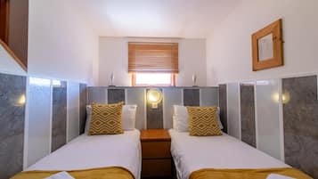 1 bedroom, desk, iron/ironing board, bed sheets