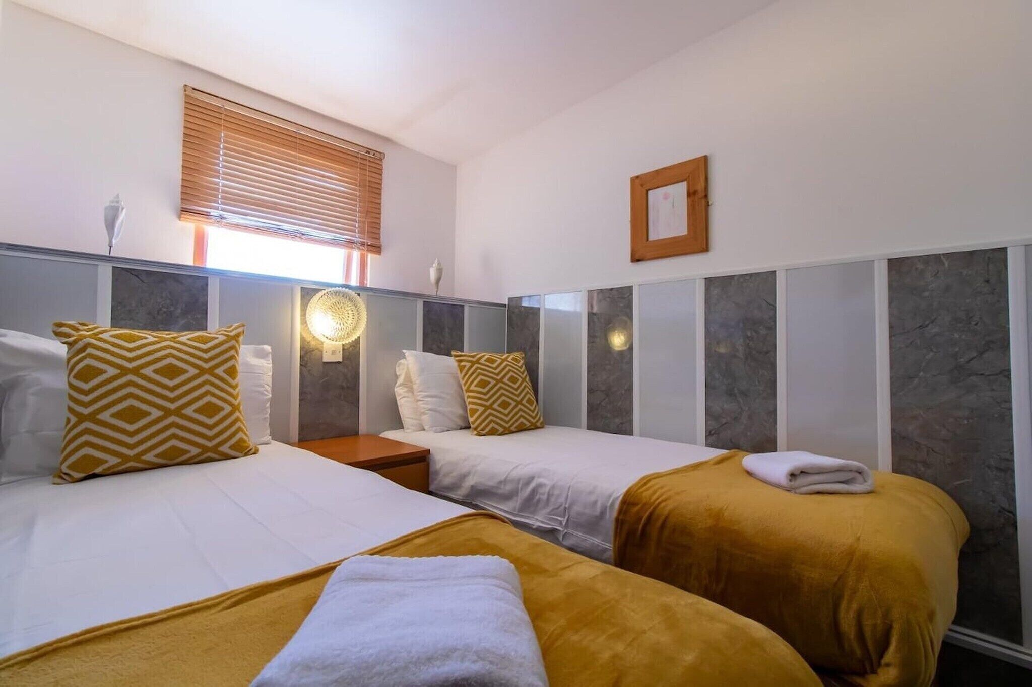 1 bedroom, desk, iron/ironing board, bed sheets