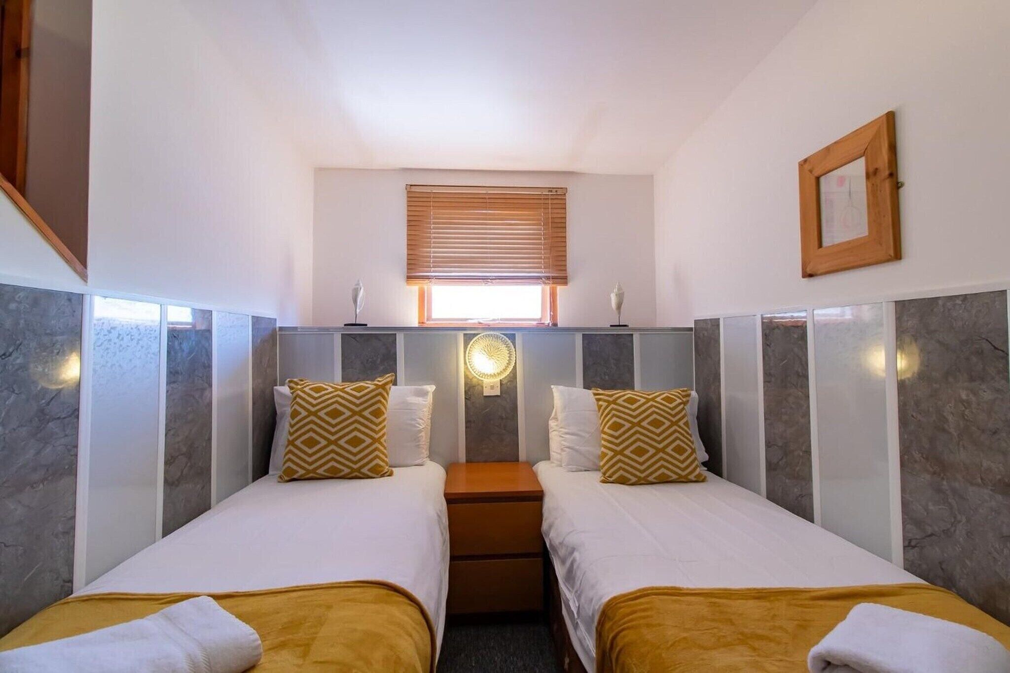 1 bedroom, desk, iron/ironing board, bed sheets