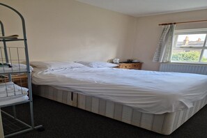 1 bedroom, desk, iron/ironing board, bed sheets