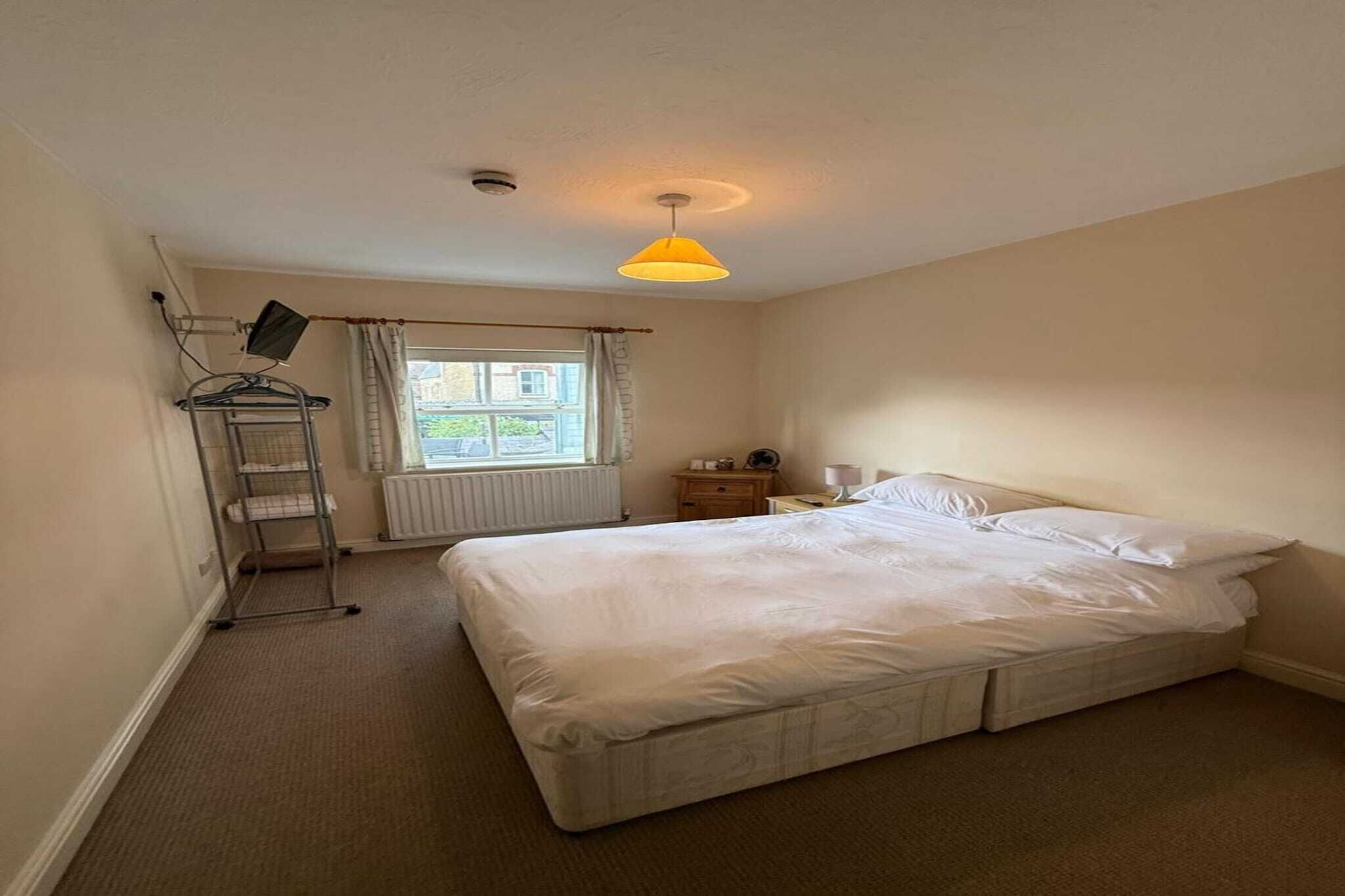 1 bedroom, desk, iron/ironing board, bed sheets