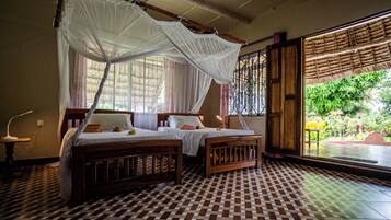 Deluxe Triple Room, Balcony, Garden View | In-room safe, soundproofing, iron/ironing board, free WiFi