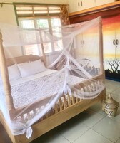 Double Room, Garden View | Blackout drapes, iron/ironing board, free WiFi