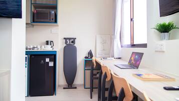 Quadruple Room | In-room safe, desk, blackout curtains, iron/ironing board