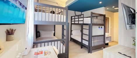 Family Quadruple Room | In-room safe, desk, blackout drapes, iron/ironing board