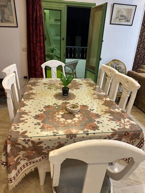 Family Triple Room | Living area | 24-inch LCD TV with digital channels, DVD player, pay movies