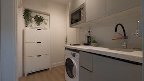 Refrigerador, microondas, horno, placa de cocina