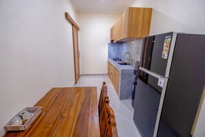 Habitación Deluxe | Cocina privada