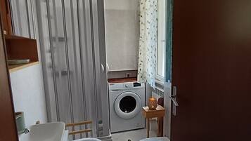 Hair dryer, bidet, towels, soap