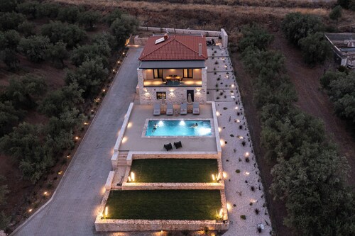 Villa Orama-where dreams meet the sea.Relax by the private heated pool all year.