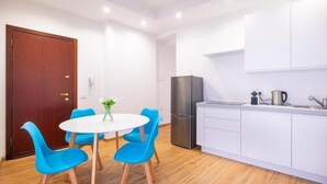 A modern kitchen with white cabinets, a stainless steel refrigerator, and a coffee maker on the counter. - One step away from Juliet's House, Piazza Erbe and Ponte Pietra quiet area (Verona)