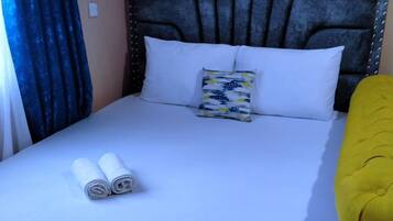 1 chambre, fer et planche Ă repasser, Wi-Fi, draps fournis