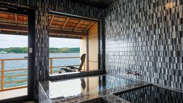 Deluxe Double Room, Balcony, Lake View | Bathroom | Separate tub and shower, hair dryer, slippers, towels