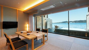 Japanese-style Quadruple Room, Private Bathroom | In-room safe, blackout drapes, free WiFi, bed sheets