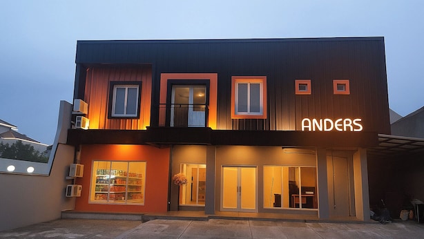 A two-story building with a modern design, featuring large windows and a prominent sign that reads "ANDERS". - Anders Permata Millenium (Curug)