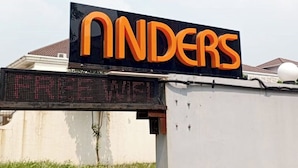 A sign with the name 'Anders' in large orange letters on a black background. - Anders Permata Millenium (Curug)