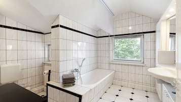 Ducha, secador de pelo, toallas