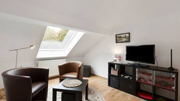 Télévision, table de tennis de table